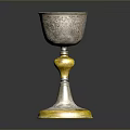 Artisan Crafted Silver Goblet With Intricate Carved Patterns And Golden Base