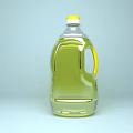 Two Bottles of Clear Edible Cooking Oil with Yellow Caps and Red Labels