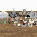 Assorted Beverages Collection with Cups Tea Sets Coffee Makers Glassware and Ceramic Mugs