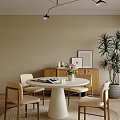 Cozy Restaurant Dining Area With Round White Table Beige Chairs Wooden Cabinet And Wall Art