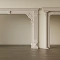 White Door Arches With Carved Details Against Light Walls And Dark Floors