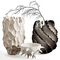 Ceramic Vessels With Textured Surfaces Sculptural Shapes And Black White Tones