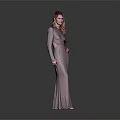 Child In Silver Long Dress Standing Against Gray Background With Hand On Hip