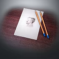Portrait Sketch on Paper with Two Pencils on Wooden Table Surface