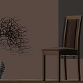 Single Chair With Light Colored Wall Wooden Floor And White Vase With Dried Branches