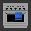 Modern Stainless Steel Kitchen Gas Stove And Oven With Four Burners And Blue Towel