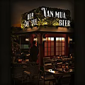 Outdoor Bar With Beer Cocktail Seating And Evening Ambient Lighting