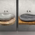 Natural Stone Washbasin with Modern Faucet on Wooden Base and Concrete Wall