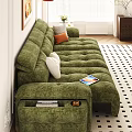 Green Velvet Sectional Sofa With White Orange Cushions Tray Magazines Tablet In Living Room