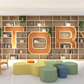 Wooden Bookshelves in Kids Reading Area with Large Story Letters Green Plants and Colorful Seating