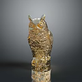 Elegant Golden Owl Sculpture With Detailed Feather Texture Standing On Gray Background