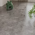 Gray Textured Floor Tiles with Green Hippo Decor Metal Ornaments Green Plant and White Columns