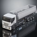 White Modern Dump Truck Loaded With Stones On Shiny Reflective Surface