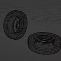 Old Car Tires Two Used Ones with Metal Rims One Standing and One Lying Flat
