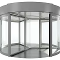 Modern Circular Revolving Door With Glass Panels And Metal Frame Entrance