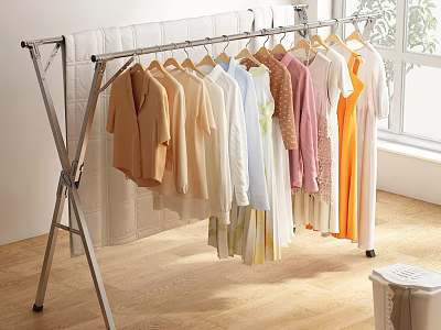 Indoor Clothes Drying Rack With Various Colored Clothes Hanging Near Window 3d model