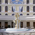 Modern Commercial Street Plaza With White Buildings Central Fountain And Crowded People