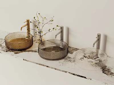 Three Gold Dark And Transparent Textured Washbasins With Faucets On Marble Countertop And Decorative Branch 3d model