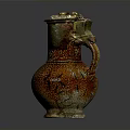 Decorative Ceramic Household Item With Orange Green Textured Surface And Dragon Handle