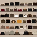 Bags Various Styles Different Colors Neatly Arranged On Multiple Wooden Shelves