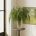 Simple Transparent Glass Vase With Green Hanging Plants On Round Table Indoor