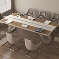 Modern Conference Table With Wooden White Top Laptops Documents And Ergonomic Chairs In Office