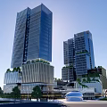 Modern Office Building With Tall Glass Curtain Walls Greenery On Top Lower Buildings And Plaza
