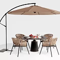 Stylish Round Outdoor Table With Wicker Chairs And Arched Parasol