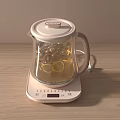 Electric Kettle with Transparent Body Ice Cubes Lemon Slices and Control Base