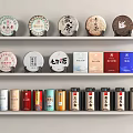 Household Items Displaying Tea Cakes Boxes And Colorful Storage Cans On Shelves