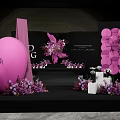 Elegant Banquet Hall With Purple Pink Floral Decorations And Geometric Backdrop Setup