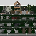 Cookware Display Shelf With Pots Pans Kettles Chalkboard And Green Plant