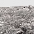Rugged Natural Mountain Terrain With Visible Rock Textures And Undulating Surface Features