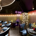 Elegant C BOX Bar Interior Featuring Bar Stools Neon Sign Decorative Lights And Seating