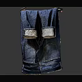 Blue Denim Jeans Hanging On Hanger With Flap Pockets And Casual Design