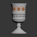 Silver Decorative Cup Featuring Red Floral Ornaments On Elegant Base For Home Decor