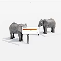 Two Grey Elephant Statues With Ivory Tusks On White Bases