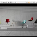 Colorful Modern Dining Chairs With Metal And Wooden Legs On Step Display Against Grey Wall