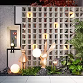 Grid Patterned Feature Wall With Warm Lighting Green Plants And Rabbit Statues In Outdoor Garden