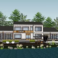 Modern Boutique Hotel Building With Waterfront View Lush Greenery And Large Glass Windows