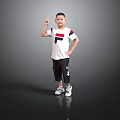 Boy Wearing White T Shirt With Red Black Design Black Shorts Gesturing On Gray Background