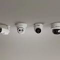 Different Types Of White Security Cameras Mounted On Ceiling Surface
