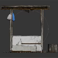 Simple Street Vendor Stall With White Concrete Base Wooden Plank Roof And Blue Bag