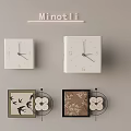 White Square Clocks On Wall With Minotli Sign Picture Frames And Flower Decorations