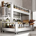 Multi tiered Stainless Steel Kitchen Shelf With Spice Jars Olive Oil Bottles And Cooking Utensils