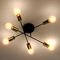 Modern Chandelier With Black Base Crossed Metal Arms Gold Sockets Six Clear Bulbs