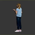 Two Happy Girls Talking And Interacting In Colorful Shirts And Pants On Gray Background
