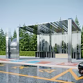 Modern Bus Station With Transparent Glass Shelter Green Trees And Parking Area