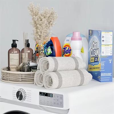 Small Bathroom Accessories Collection Including Folded Towels Bottles Basket And Cleaning Products 3d model