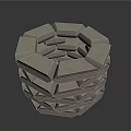 Stacked Stone Cylindrical Structure With Geometric Design And Textured Surface